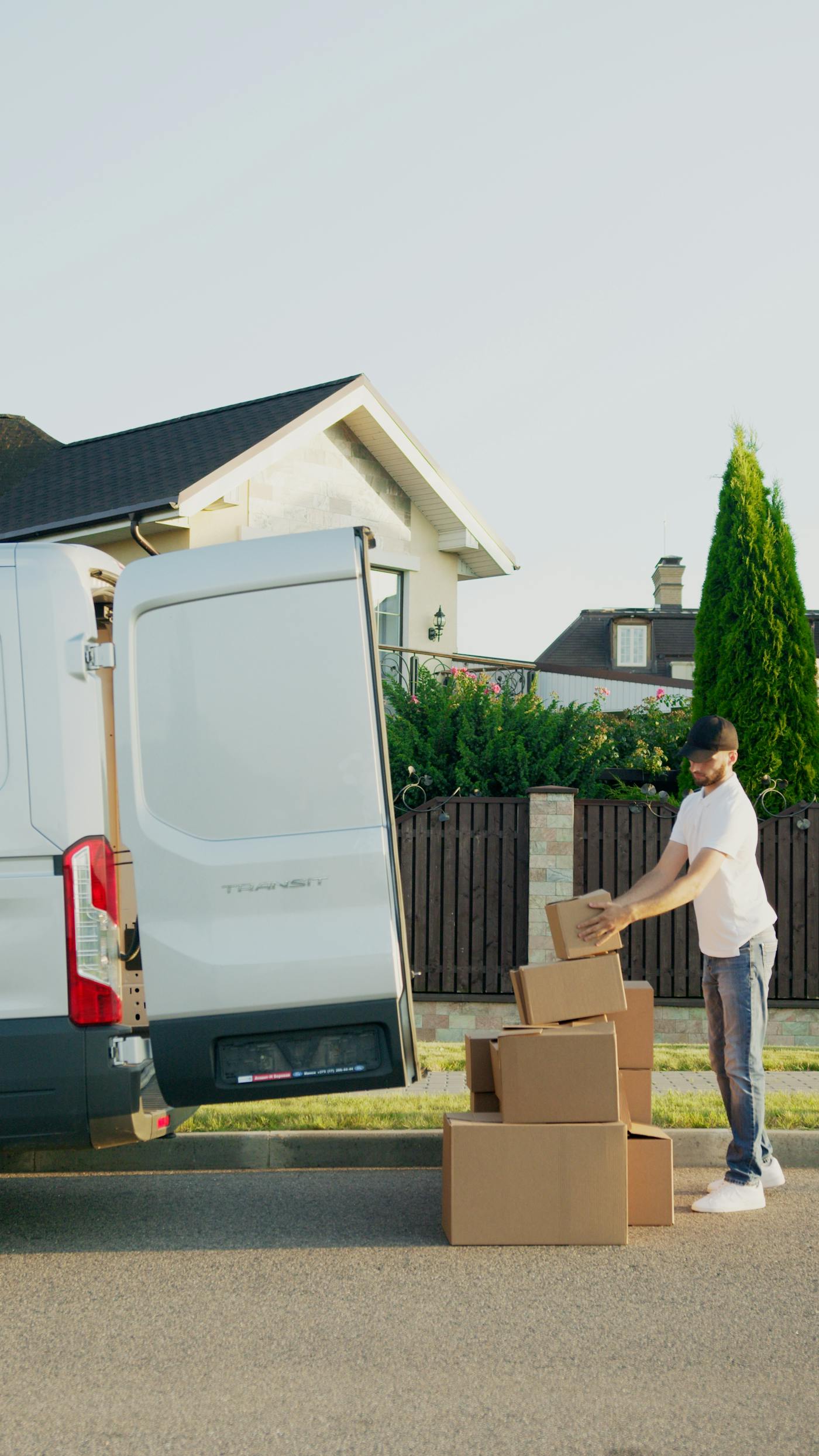 Delivery professional working with parcels in a logistics setting