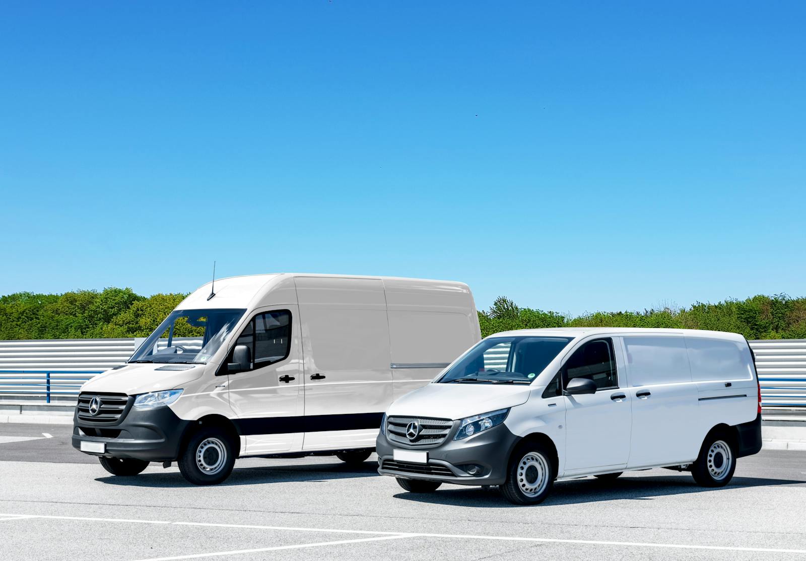A coordinated fleet of white delivery vans on the road